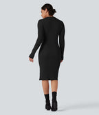 Robe pull mi-longue moulante fendue col montant manches longues
