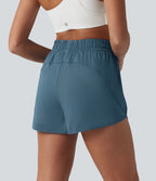 Short de yoga 7,5 cm taille haute à ourlet arrondi et poches