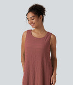 Robe midi sans manches à encolure arrondie avec coussinets amovibles et ourlet à volants