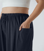 Pantalon Large Casual Taille Mi-Haute Taille Élastique Cordon Poches Latérales Ourlet Flottant Grande Taille