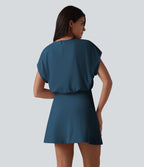 Robe de sport mini de yoga SoftlyZero™ Airy 2-en-1 effet frais InstantCool col rond à manches courtes, demi-zip et poches, accès facile Easy Peasy