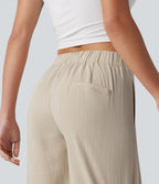 Short tailleur bermuda aspect lin taille mi-haute asymétrique 25 cm avec poches