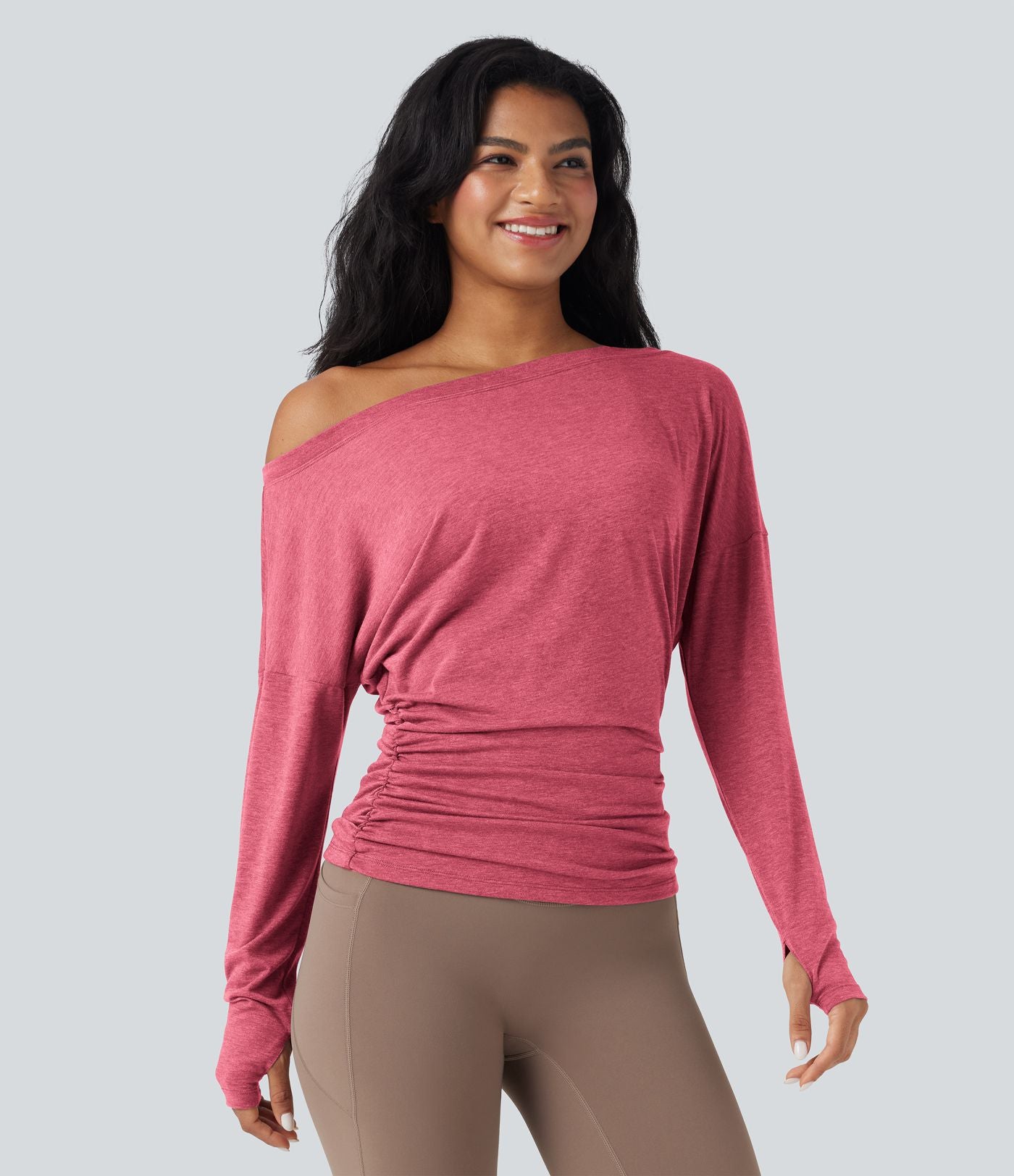 Haut de sport yoga asymétrique manches longues à trous pouces froncé