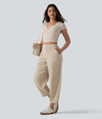 Pantalon casual taille mi-haute coupe tonneau aspect lin, avec poches