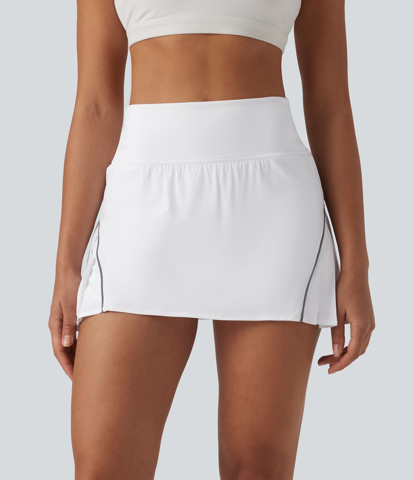 Jupe de tennis mini Breezeful™ plissée 2-en-1 taille haute, réfléchissante, séchage rapide, avec poches