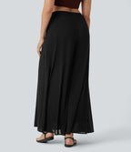 Pantalon fluide et ample avec superposition en mesh, poches latérales et taille haute