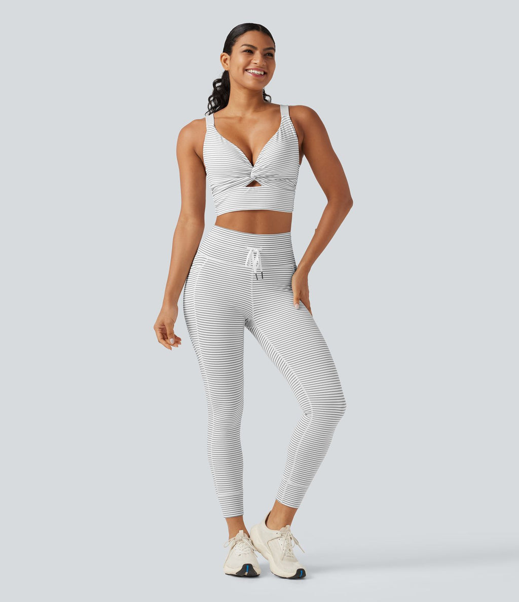 Brassière de sport push-up rayée à maintien léger, avec coussinets fixes, idéale pour le yoga.