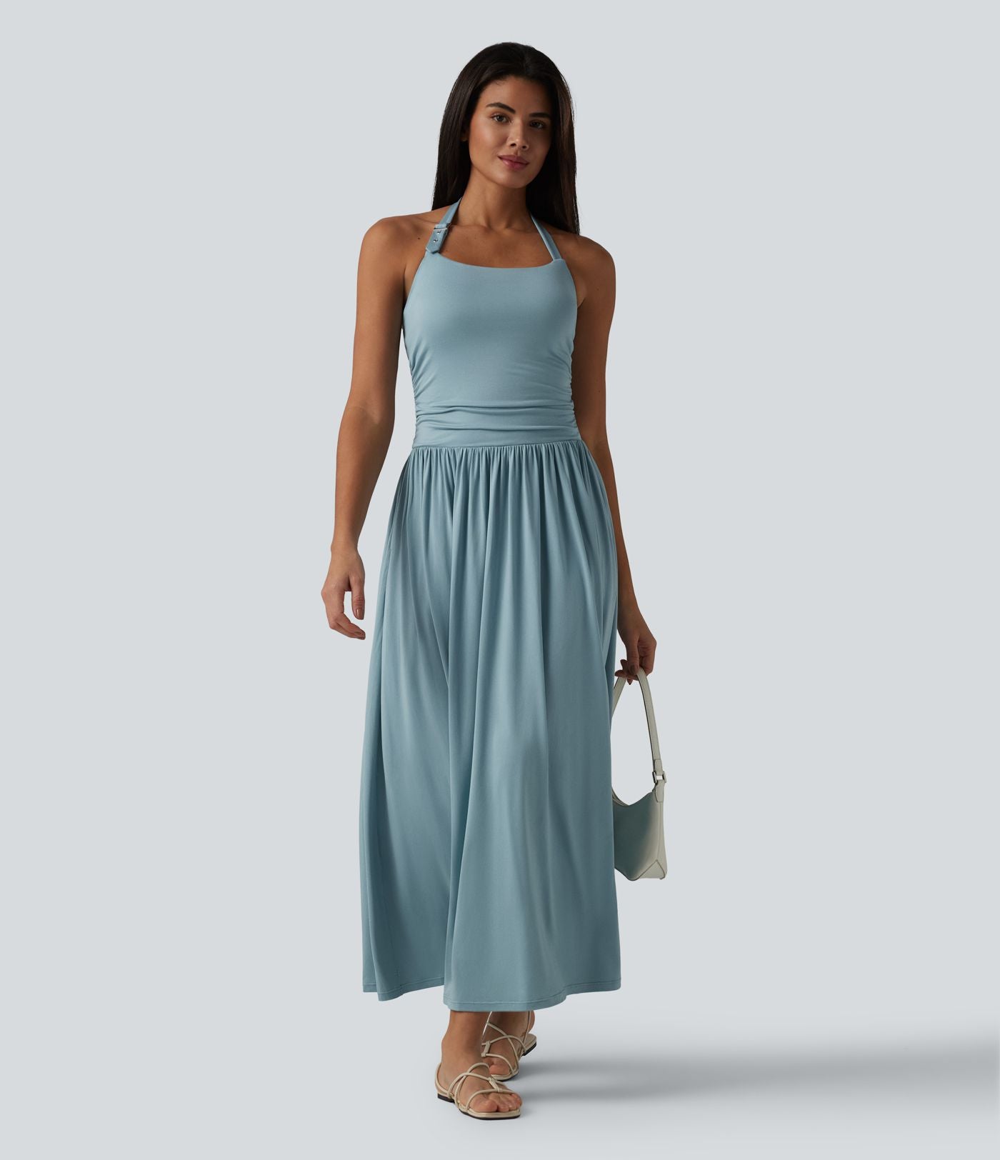 Robe longue fluide dos nu avec tour de cou, brassière intégrée et poches