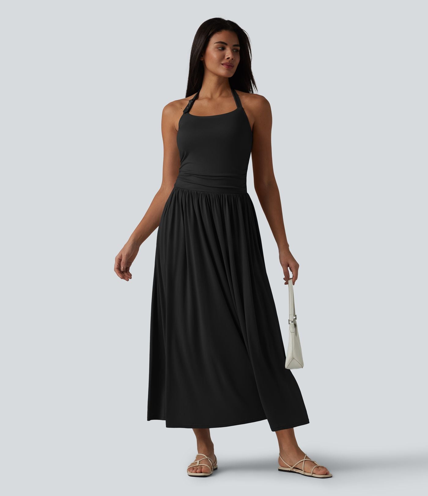 Robe longue fluide dos nu avec tour de cou, brassière intégrée et poches