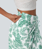 Jupe longue moulante taille mi-haute avec nœud devant et fronces imprimé floral/à rayures