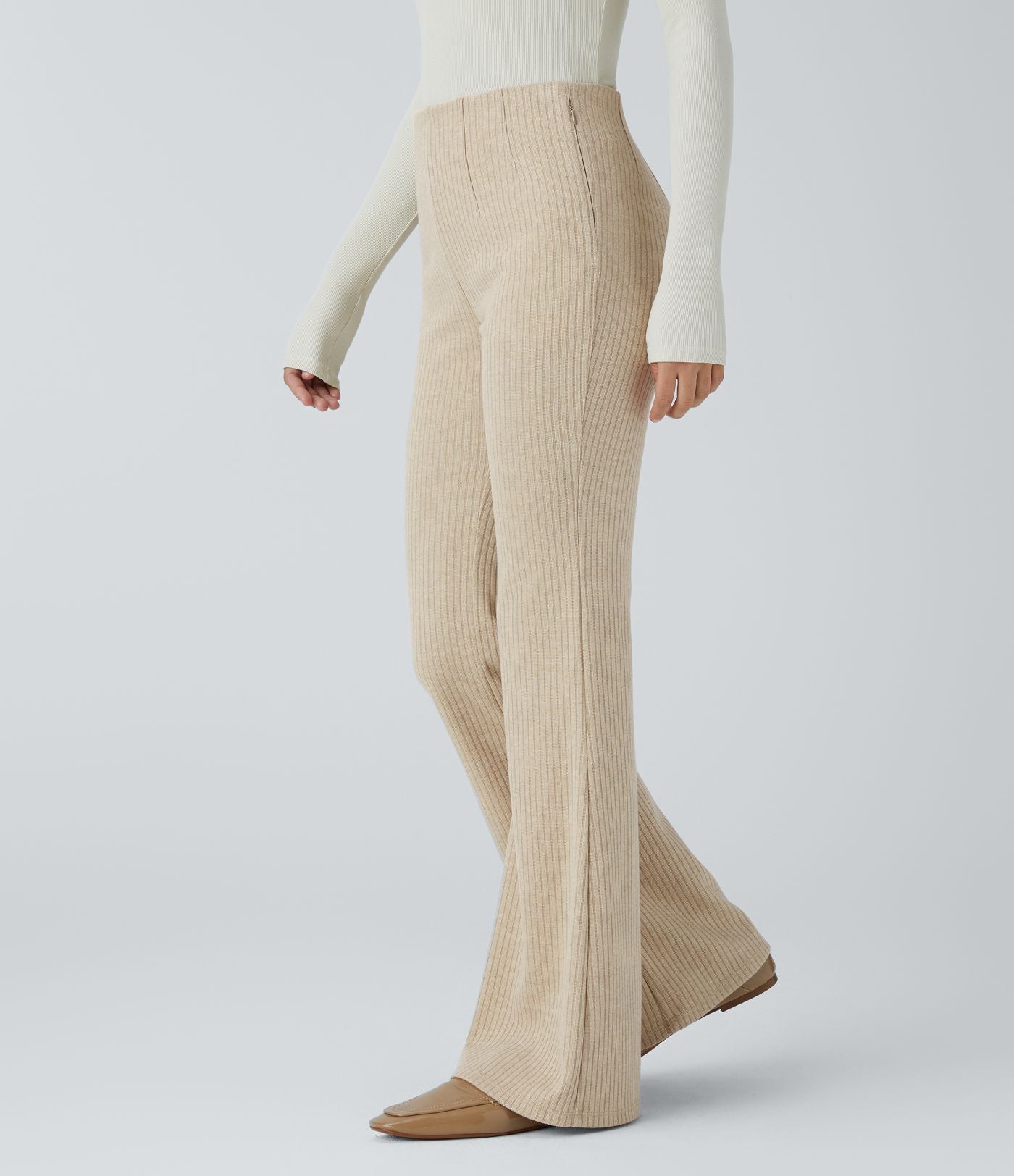 Pantalon décontracté évasé en maille côtelée à taille haute et poches zippées latérales