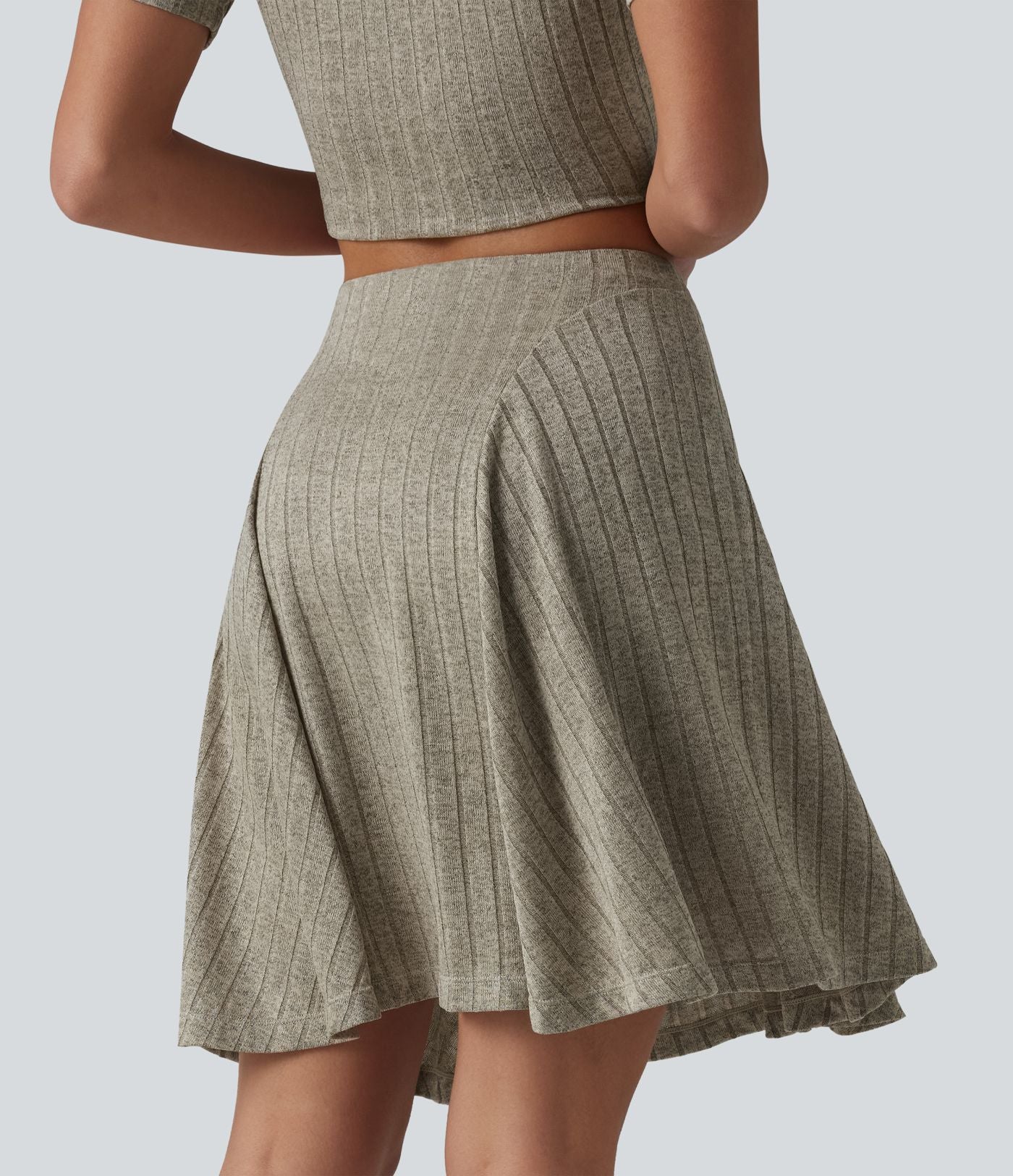 Jupe mini évasée casual 2 en 1 en maille côtelée taille haute avec poches
