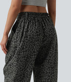 Pantalon léopard décontracté taille mi-haute et jambes fuselées avec poches