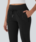 Pantalon jogging de voyage taille haute avec cordon de serrage, coupe fuselée et poches latérales zippées