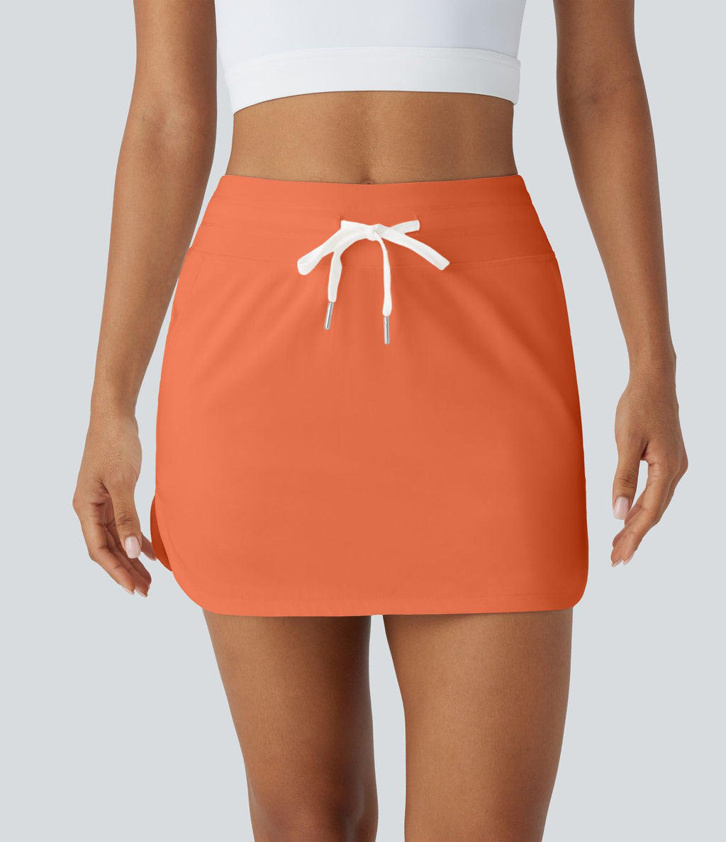 Softlyzero™ QuickDry Jupe de golf courte deux-en-un à taille haute avec poches latérales, ourlet arrondi, cordon de serrage - Poche pour tee de golf