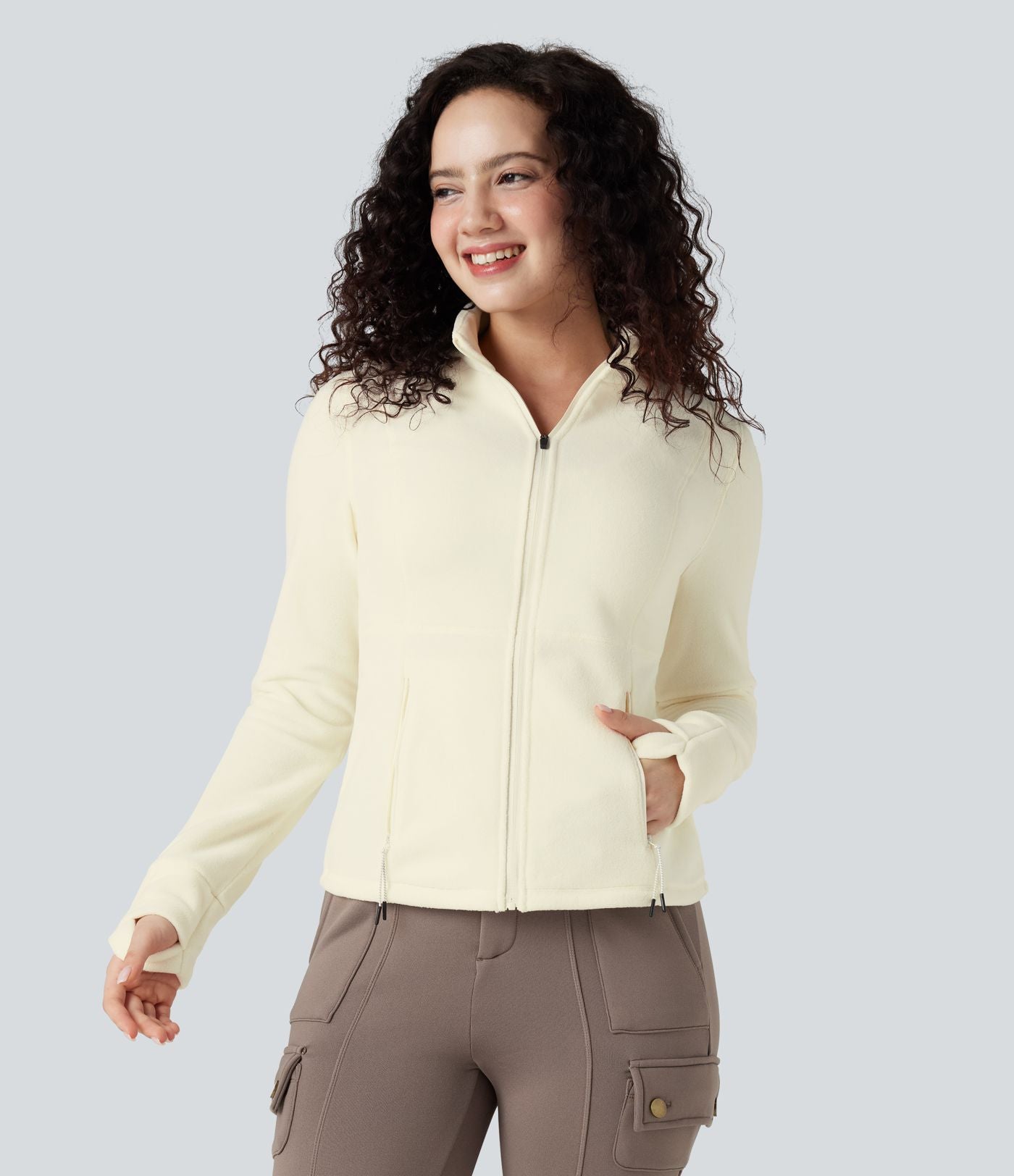 Veste randonnée col cheminée manches longues avec trous pour pouces et poches