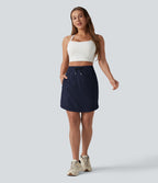 Jupe-short golf mini 2-en-1 taille haute à cordon de serrage et ourlet arrondi avec poches - Longueur plus longue