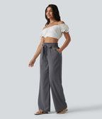 Pantalon décontracté effet lin taille haute, coupe droite, ceinturé avec finitions ondulées et poches