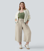 Pantalon grande taille large fluide taille haute avec cordon de serrage, poches et aspect lin