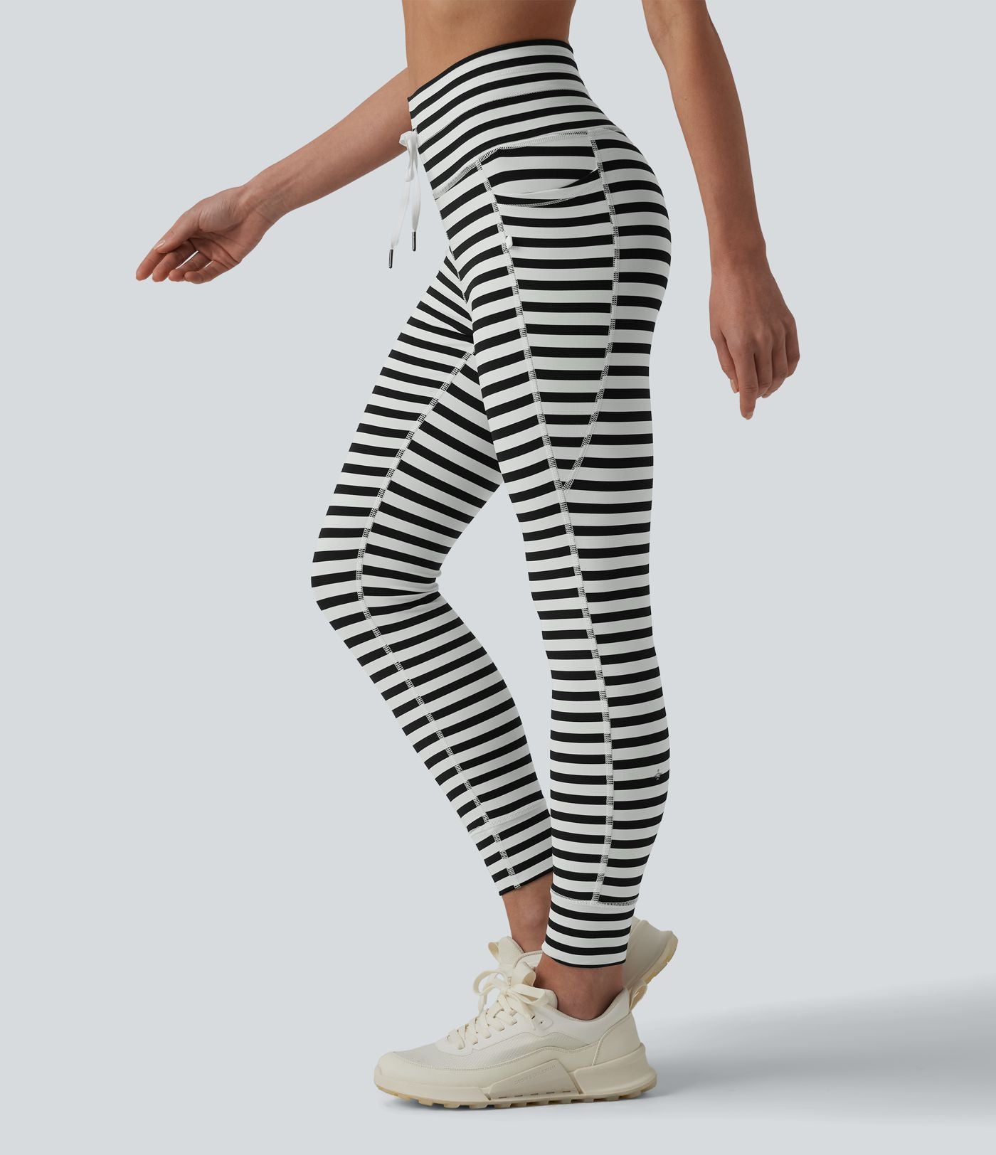 Legging yoga 7/8 taille haute à rayures et cordon de serrage avec poches