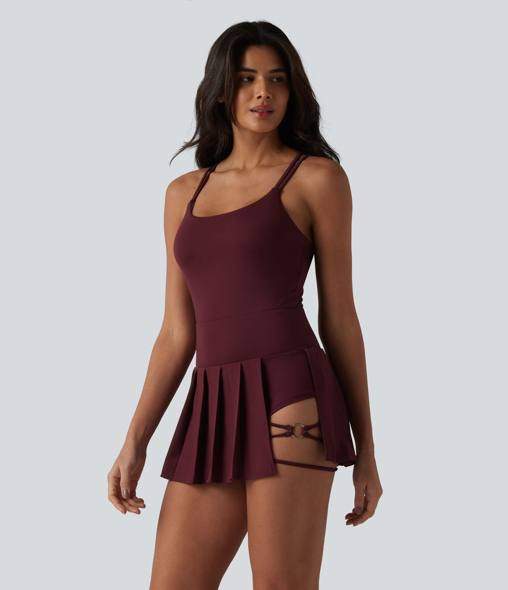Robe sport mini 2-en-1 à bretelles col U, dos nu croisé, plissée à ourlet asymétrique, soutien-gorge intégré et poches