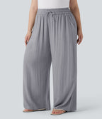 Pantalon décontracté grande taille large fluide taille haute effet lin avec cordon de serrage et poches
