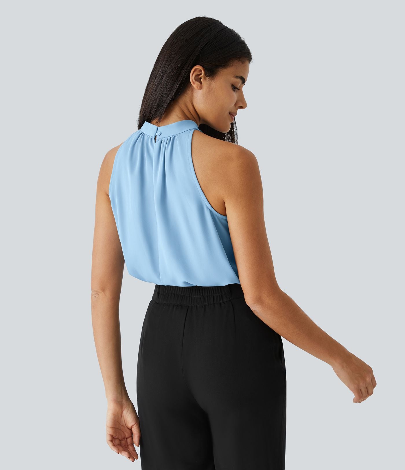 Blouse Travail Sans Manches Ourlet Courbé Col Haut Découpe au Dos Plis