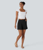 Short décontracté gaufré à taille haute, fermeture zippée, bouton et poches latérales