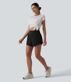 Short yoga 2-en-1 gainant taille haute à pois réfléchissants, ourlet arrondi croisé et œillets avec poches