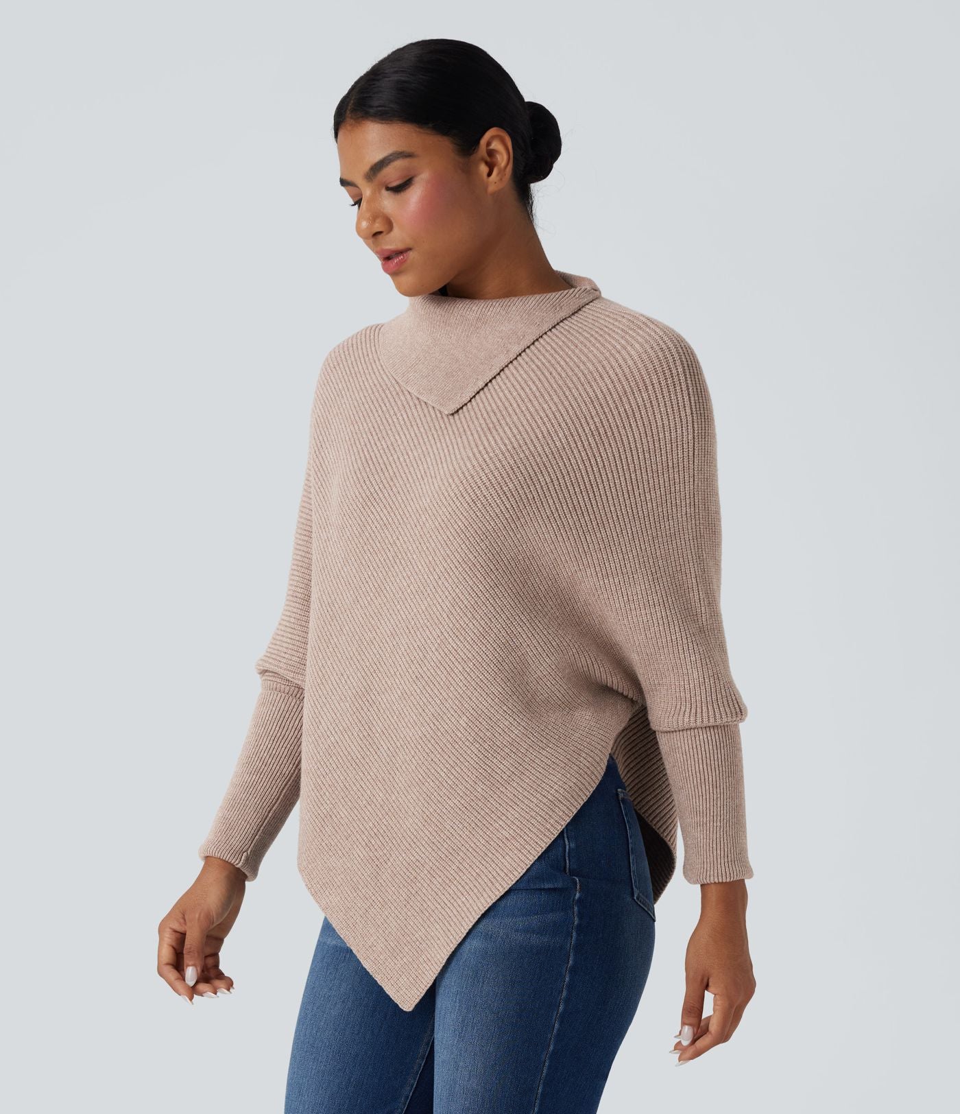 Pull cape décontracté col roulé manches chauve-souris ourlet asymétrique