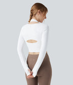 Halara UltraSculpt™ Top court de sport zippé dos nageur à manches longues avec bonnets moulés push-up et passants pouces