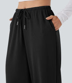 Pantalon de yoga tissu gaufré taille mi-haute jambe droite avec cordon de serrage et poches