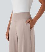 Pantalon large fluide taille haute avec poches latérales