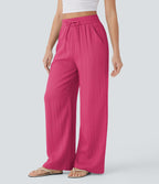 Pantalon large fluide taille haute avec cordon de serrage, poches latérales et aspect lin