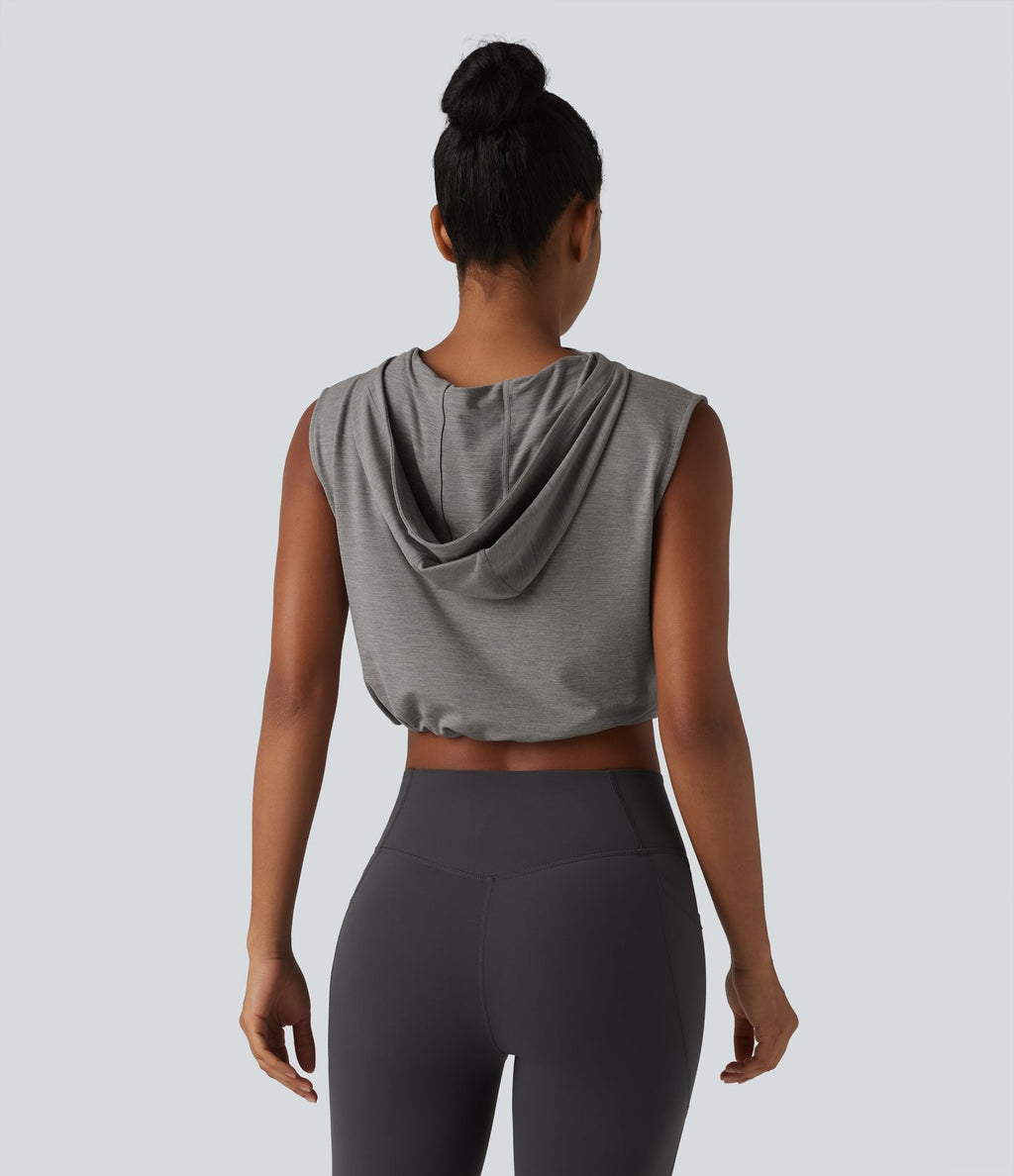 Débardeur de yoga court à capuche avec demi-zip