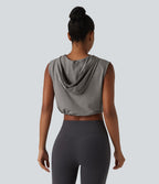 Débardeur de yoga court à capuche avec demi-zip