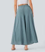 Pantalon fluide et ample avec superposition en mesh, poches latérales et taille haute