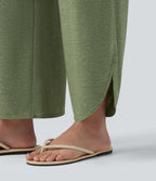 Pantalon décontracté taille haute gainant avec ourlet arrondi et poches
