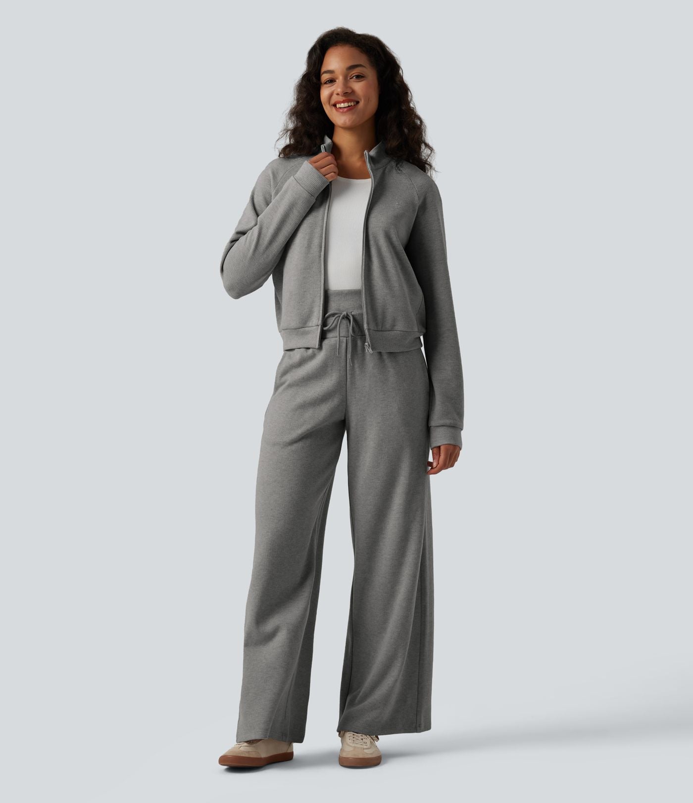 Veste casual côtelée à col montant, manches longues et fermeture zippée avec poches