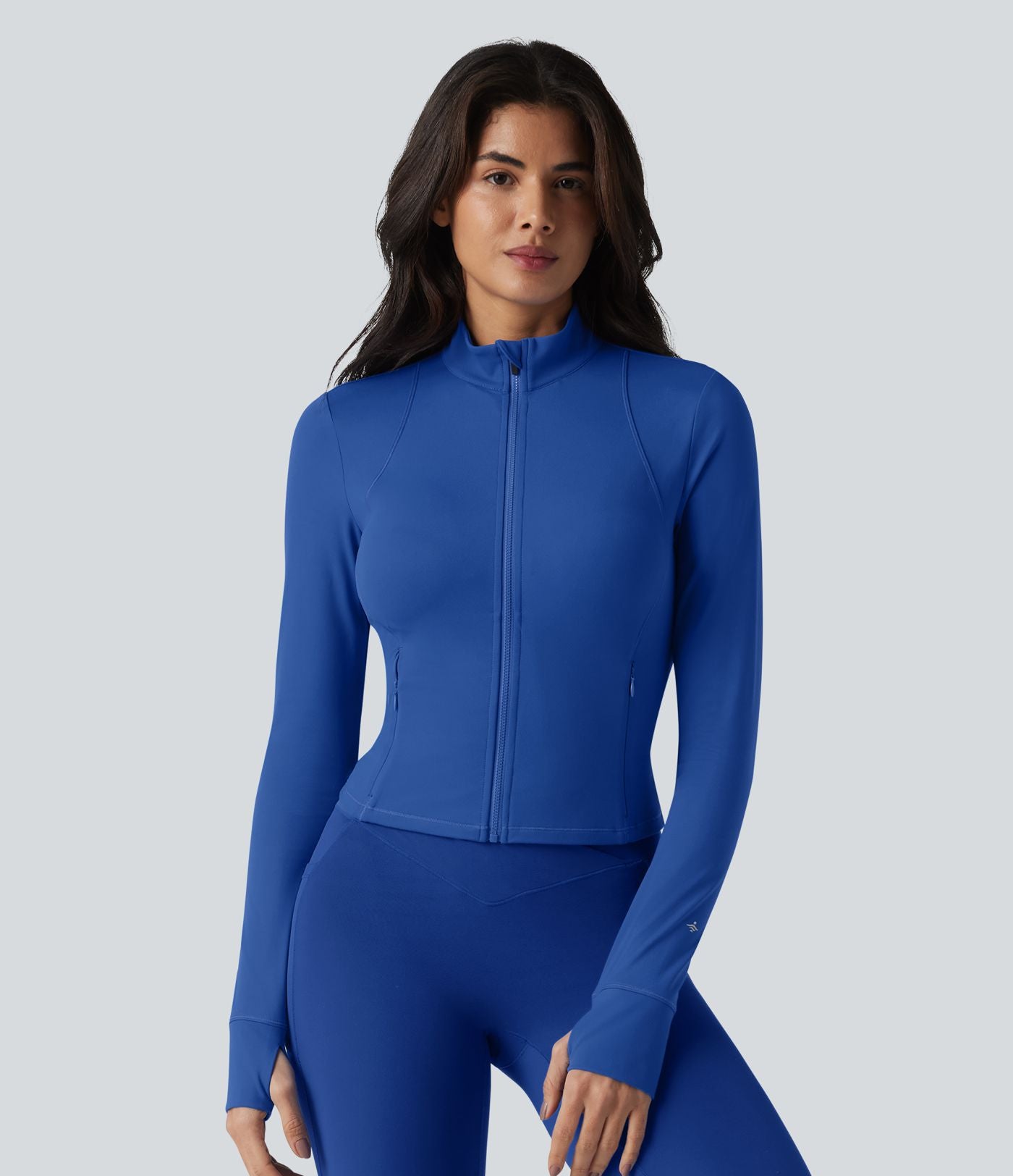 SoftlyZero™ Plush Veste de yoga col montant à manches longues avec trous pour les pouces, dos torsadé, empiècements en mesh respirant et poches