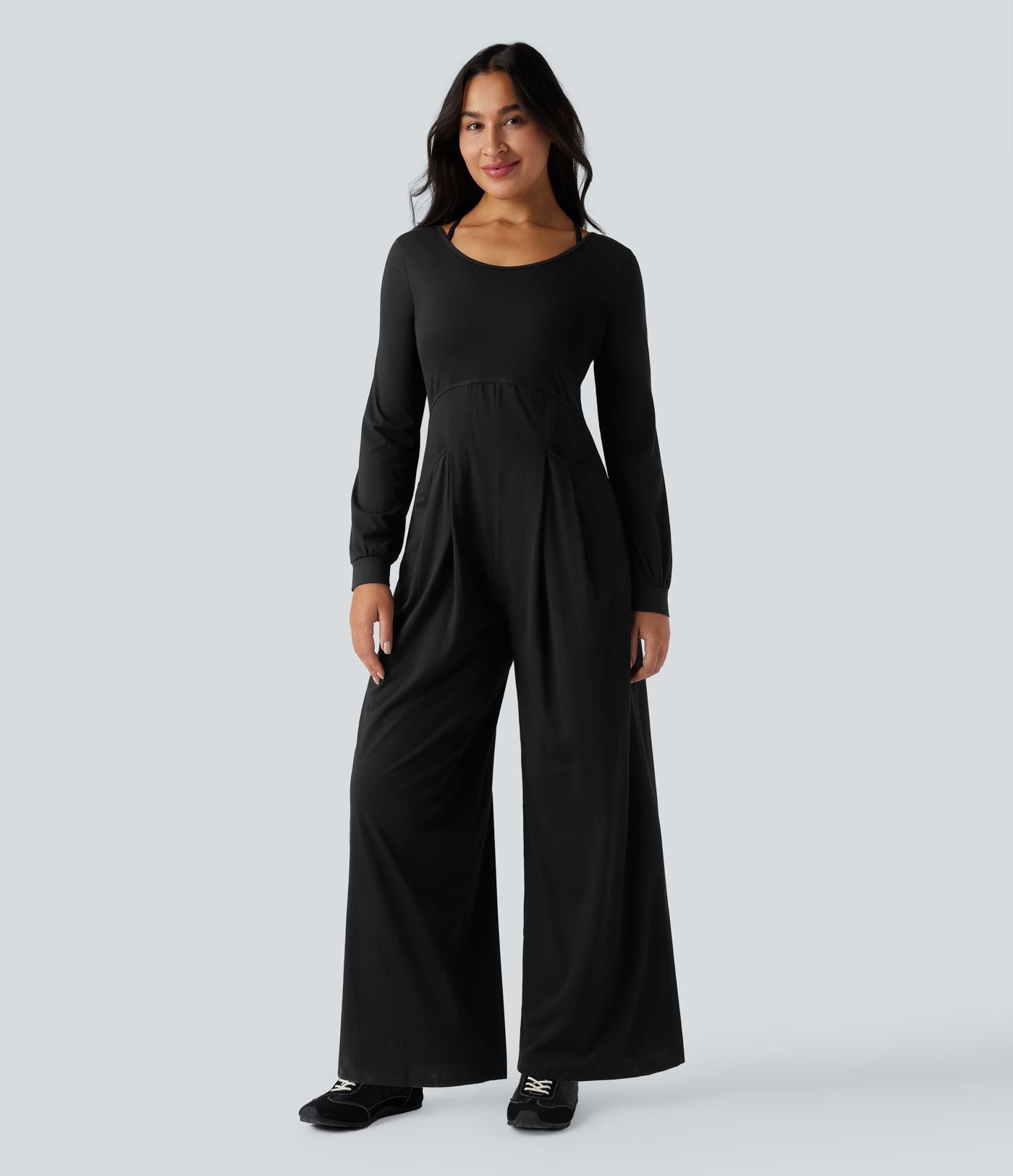 Combinaison-pantalon ample décontractée dos nu col rond à manches longues avec poches