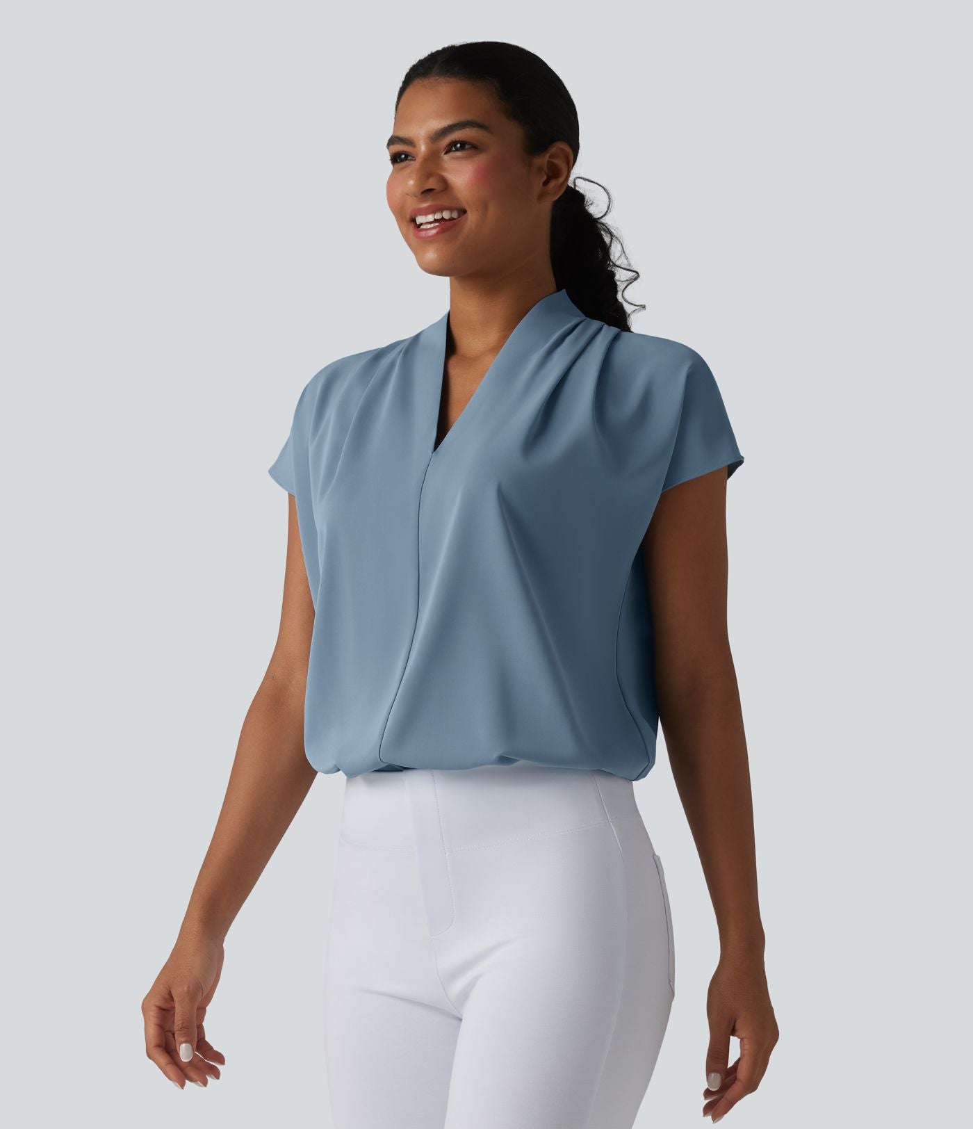Blouse esprit bureau ample défroissage facile, col V et manches chauve-souris