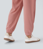 Pantalon de jogging décontracté taille haute fuselé en tissu gaufré avec poche latérale