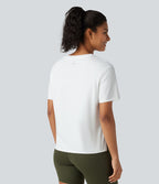 Haut de sport en coton col rond à manches courtes, ourlet fendu et coupe ample pour le yoga