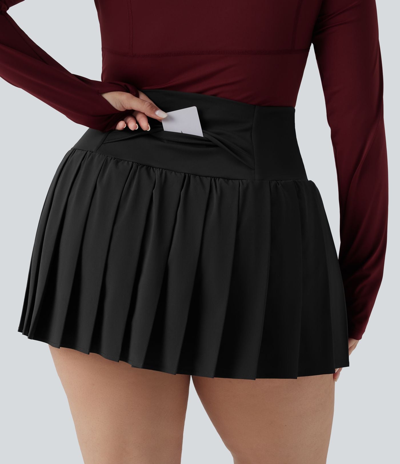 Breezeful™ Jupe-short yoga mini 2-en-1 grande taille à plis et ourlet asymétrique, taille haute, séchage rapide avec poches