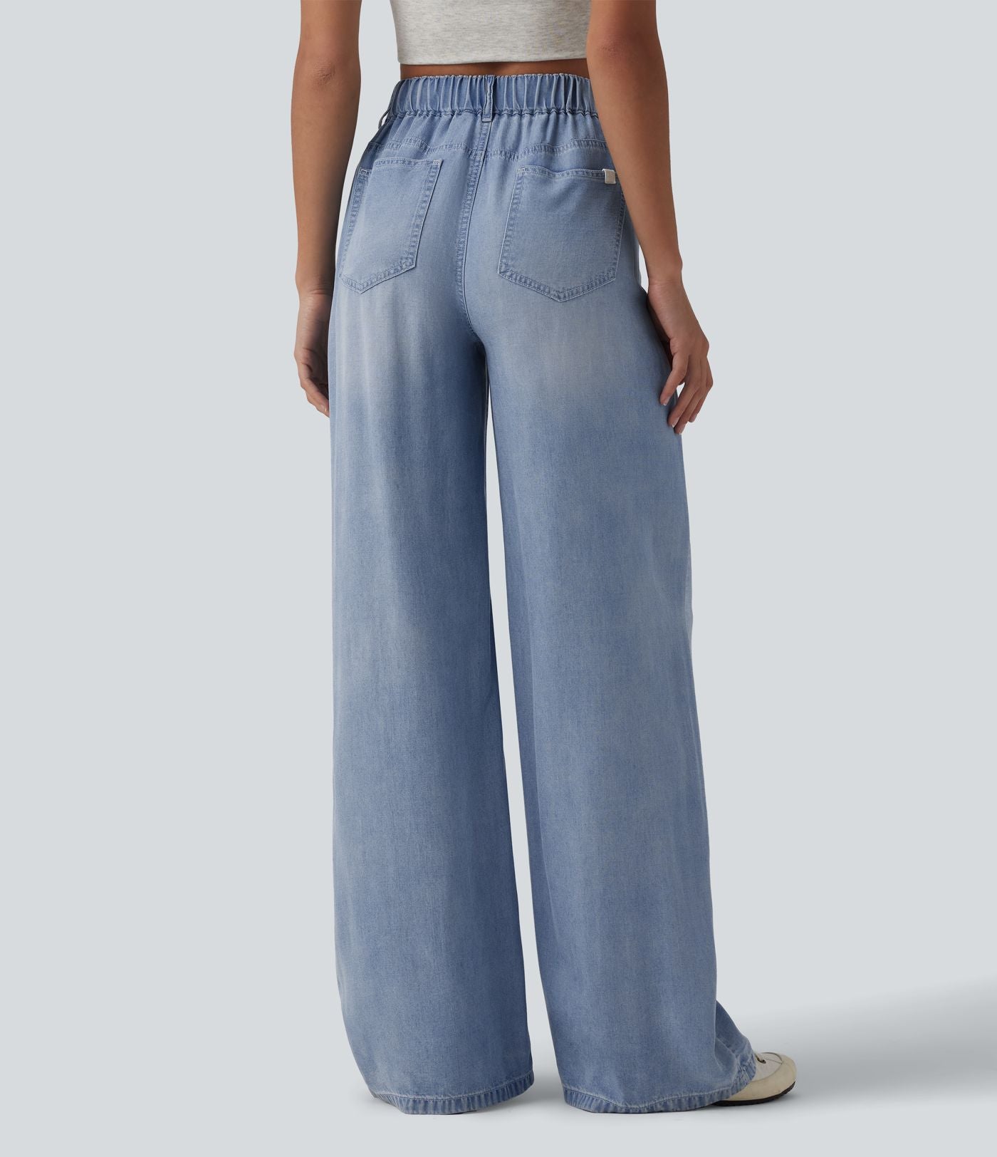 Jean large décontracté asymétrique en lyocell taille mi-haute drapé avec poches
