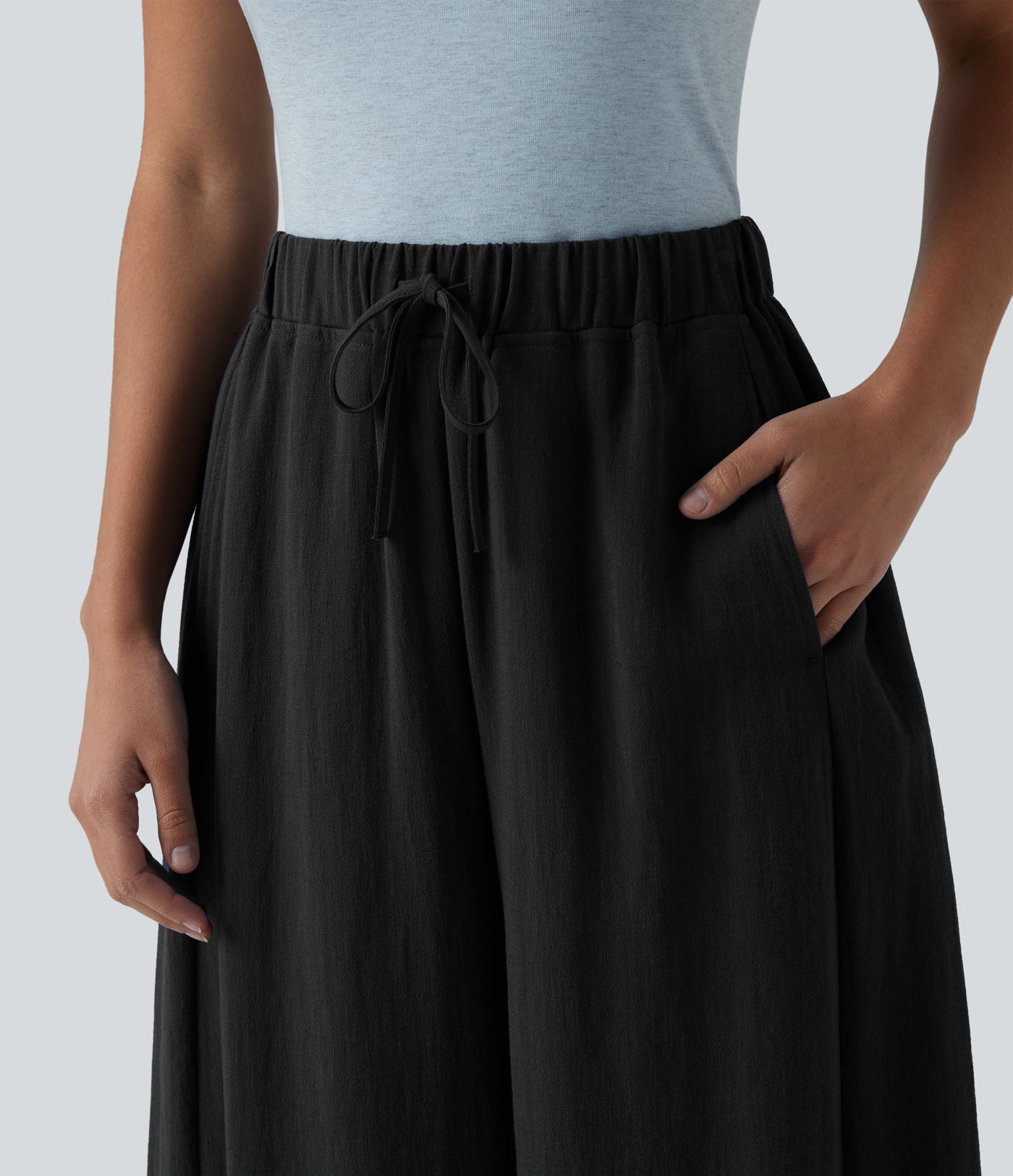 Pantalon décontracté effet lin jambes ballon taille haute avec cordon de serrage et poches