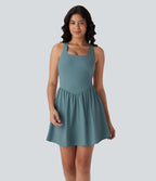 Robe active fluide Breezeful™ mini 2-en-1 à séchage rapide avec dos nu, style corset et poche - Longueur allongée