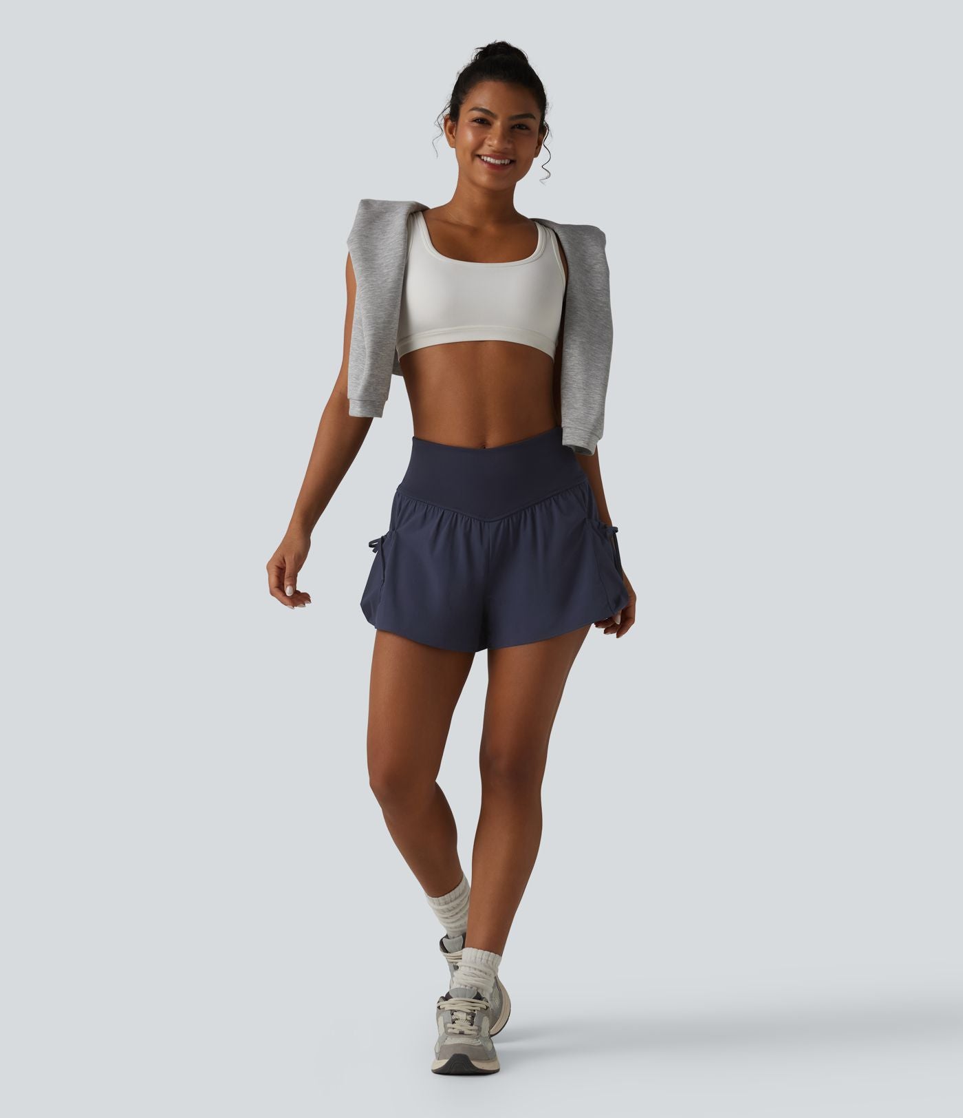 Short de sport ample 2 en 1 taille haute avec poches