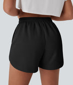 Short de yoga taille haute avec cordon de serrage, filet contrasté, ourlet courbé et poches